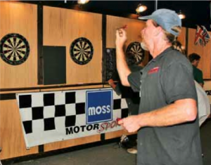 The Moss-sponsored Friday evening dart tournament had a pub-like feel, appropriate for a show with plenty of British cars.