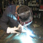 Cary Smith of Specialized Welding running a MIG bead.