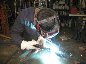 Cary Smith of Specialized Welding running a MIG bead.