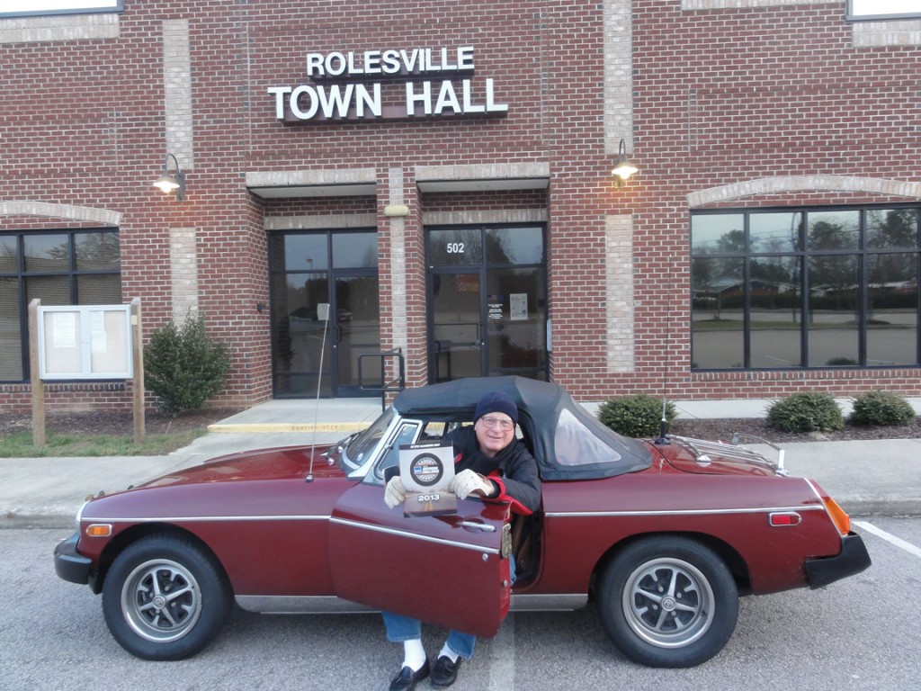 I registered last night Feb 15 and took these pictures first thing the next morning Feb 16. We drove our MGB to our club's breakfast event even though the weather was wet with a rainy/snow combo. We're excited to get started. The first picture is of Rolesville, NC Town Hall - the town that we live in. The second picture is of Cary High School in Cary, NC where we met for breakfast. So now we have started with 7 points (1 pt for each city and 5 pts for bonus submission before March 1. Pat Wharton