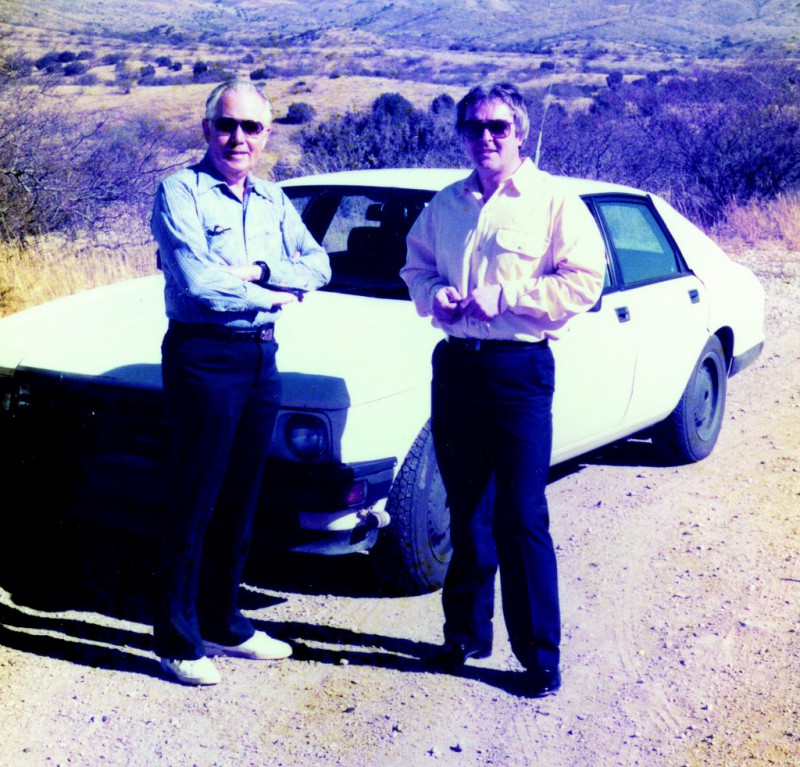 This shot captures Mike Cook (left) and Jaguar Corporate Communications Director David Boole with a disguised Jaguar XJ40 sedan. The two were setting up a test route around Tucson, Arizona, for the 1987 debut of the new car.