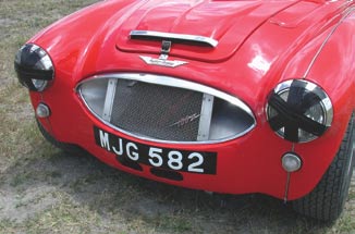 MJG 582 Rally designation was bestowed on #106 by Geoff Healey. Works grille provides max airflow and radiator protection. Taped headlights reflect on a bygone era of sports car racing.