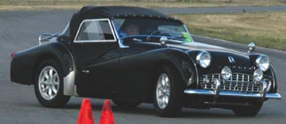 Bob Prieve isn’t a fan of trailers. Here, the rack-and-pinion steering conversion helps him rip through the slalom at Buttonwillow Raceway.