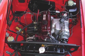 The Moss Motors MGB Supercharger System is compact, and installation doesn't require cutting or permanent modifications to the car. Your engine should be in sound operating condition before you add the supercharger.