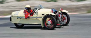 E. Alan Moss took to the track in his Matchless-powered '34 Morgan SS. Competing in the Group 1 historic race, the tiny three-wheeler put on quite a show.