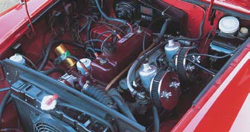 When in doubt, bore it out: masquerading as a 1.8, Tim's bored and stroked 2.7 makes about 100 hp at the rear wheels. A K&N oil filter is one of the few visible performance parts.