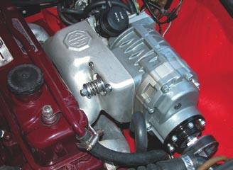 Tons of development time went into the designing the intake manifold to provide proper distribution with the MGB's siamesed center intake ports. The spring assembly is part of the pop-off valve that protects the supercharger in case of a backfire in the intake system.