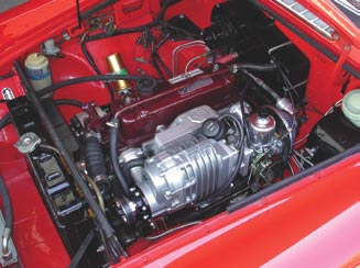 It's hard to argue with the wow factor when you open the hood and reveal the Moss supercharger system. Nice details such as the MG logo cast into the manifold and the new SU carb make the supercharger system appear period-correct.