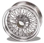 This wheel (854-415) is a 15x6.5 tubeless style for Series II E-Types. Its 72 spokes are center-laced, and the hub is forged for a flat, easy clean surface.