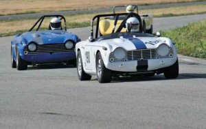 There were several TR4s and TR250s in the car show but the true Triumph competition was on the racetrack, during the Group 2 road race and the MG/Triumph challenge.