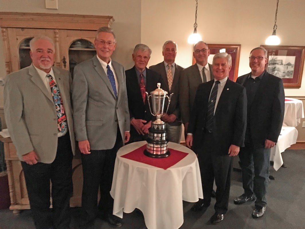 The Nuffield Challenge Trophy is accepted by officers and members of the MG Car Club, Rocky Mountain Centre (L to R): John Fraioli, Neil White, Al Wulf, Keith Kerr, Jonathan Lane, Alan Magnuson, and Rich Weiskopf.