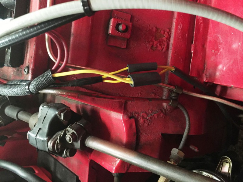 This shows the overdrive wiring coming from the gearbox (down) and to the overdrive switch (up). Notice that I replaced one of the single barrel connectors with a dual connector to easily allow me to tie in the yellow wire to the relay.